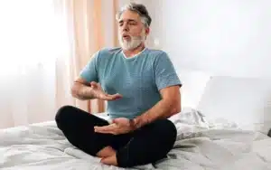 man practices breathing